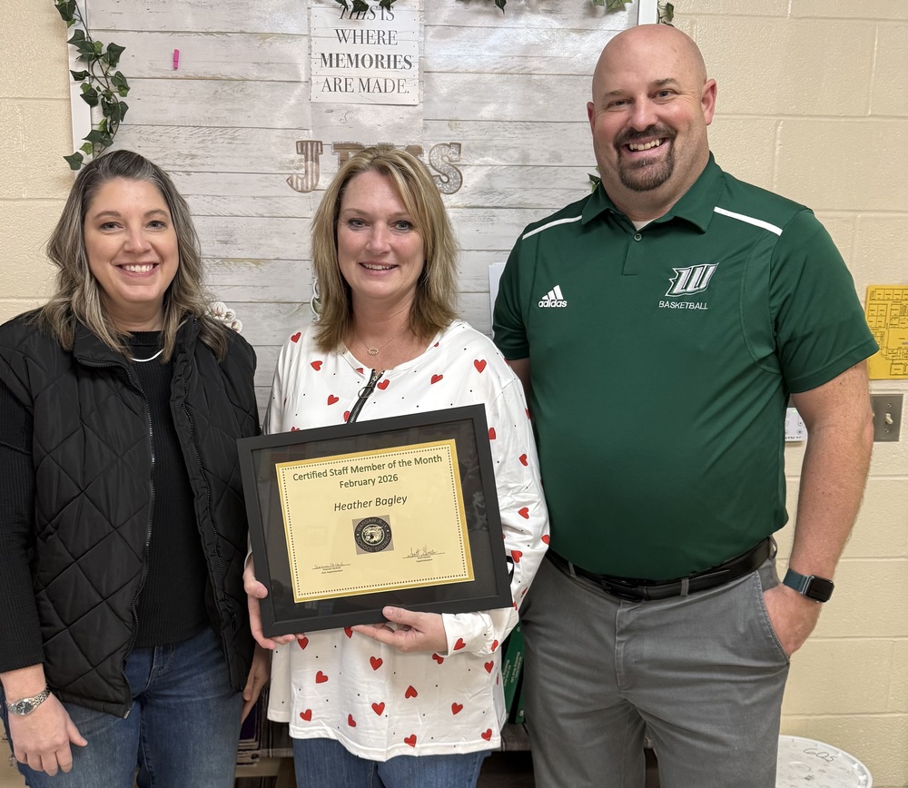 Ms. Bagley accepts award