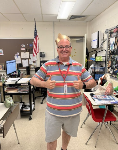 Mr. Sollitto wearing a crown giving 2 thumbs up