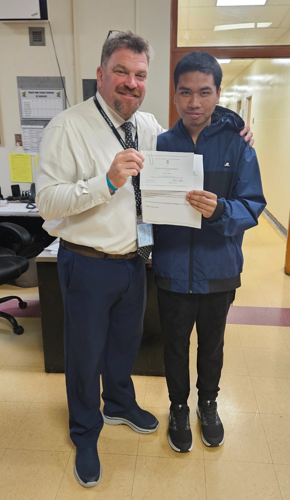 Mr. Gibbons and Ethan Phin in the main office
