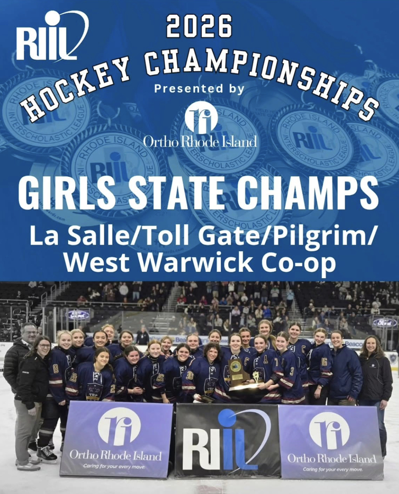 hockey team posing on ice