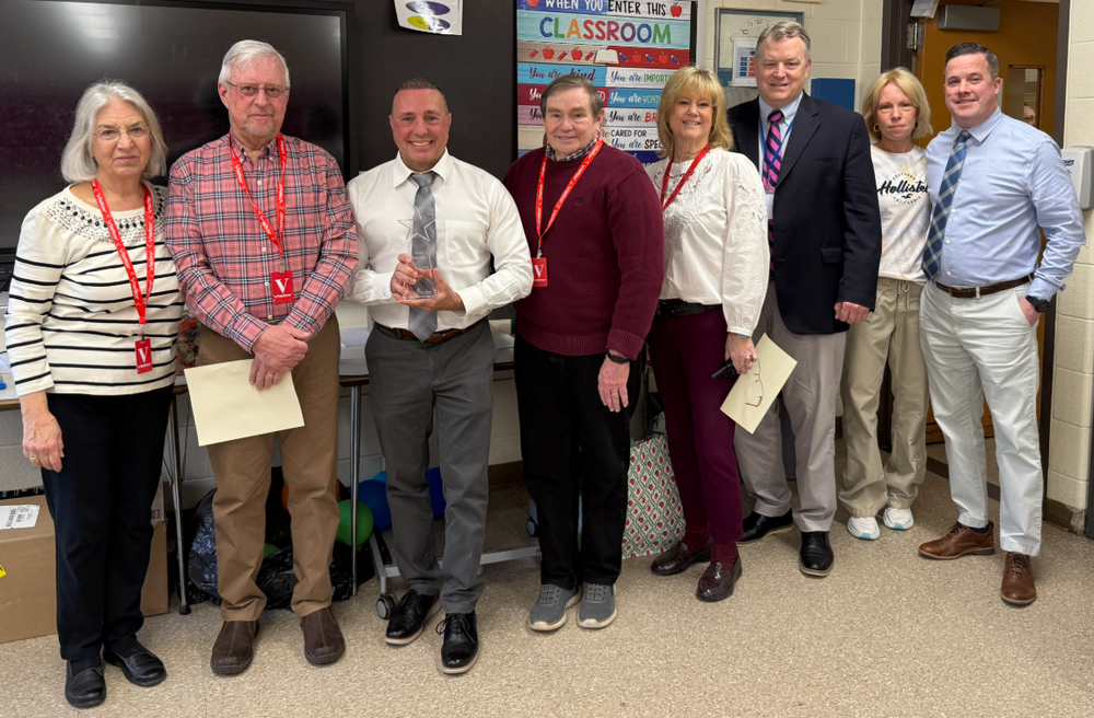 group of people posing with Mr. Hagopian