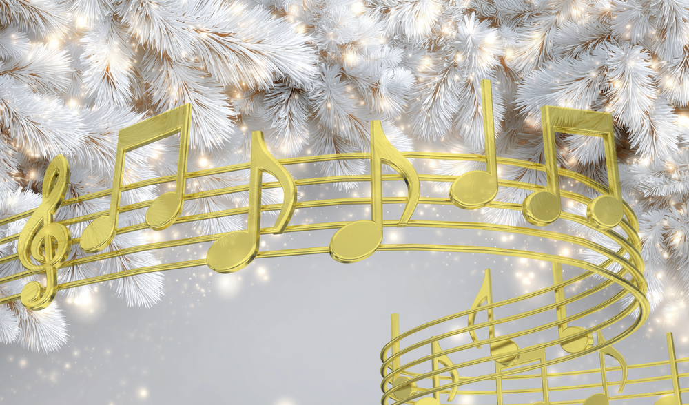 gold musical notes on top of a winter scene