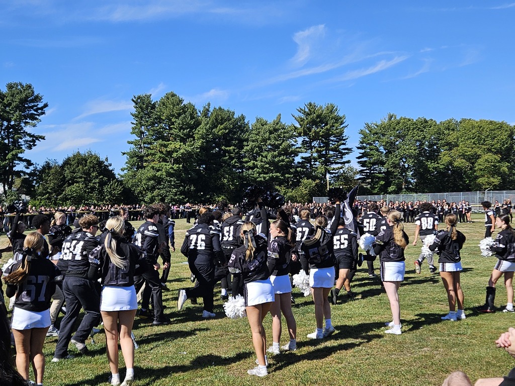 Football team entering the field