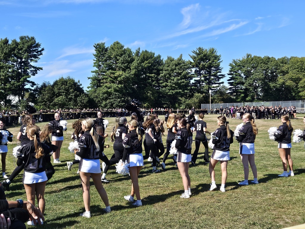 Girls Soccer team entering the field