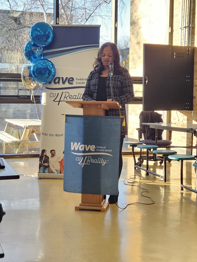 Ranika Reyes talking at a podium