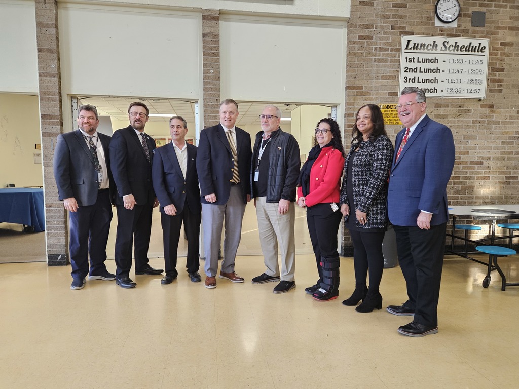 Dignitaries in the cafeteria for the financial literacy fair