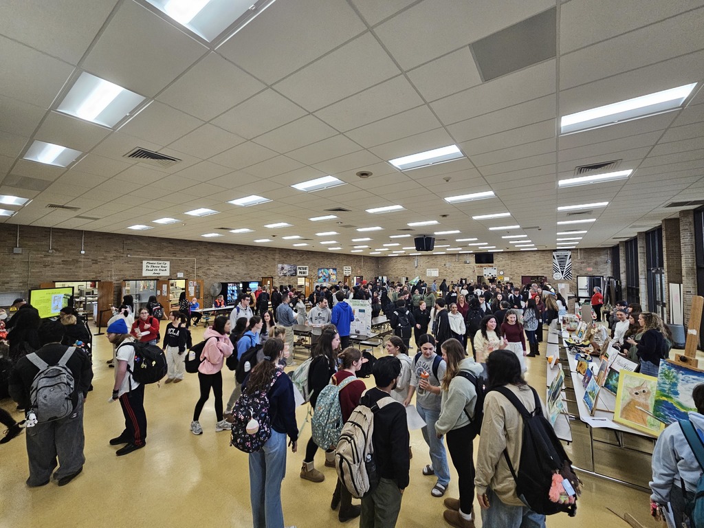 Students looking at course offerings