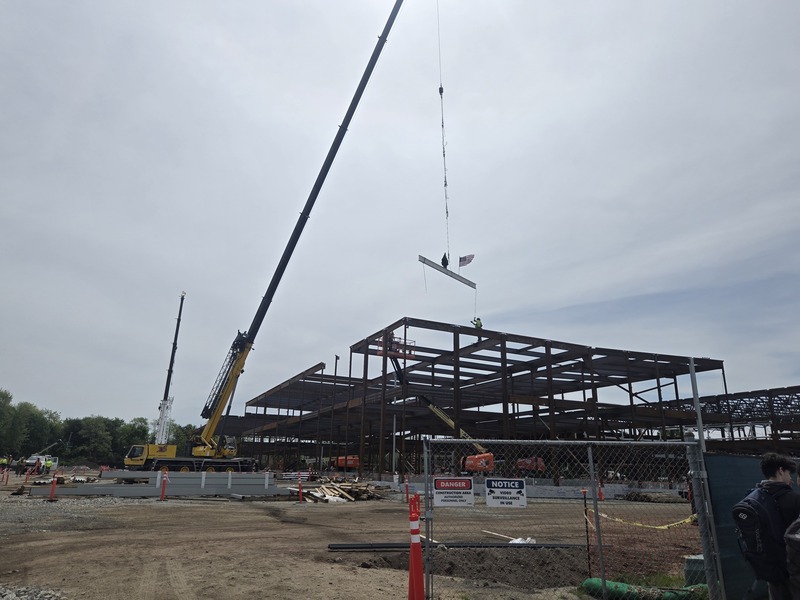 The beam is moved into place.