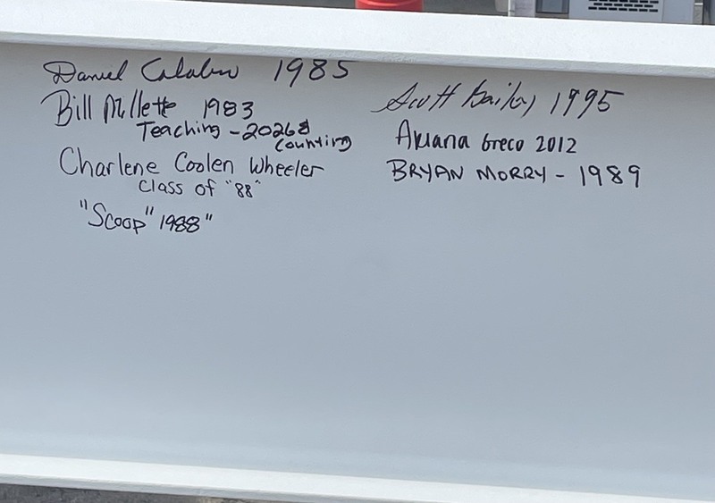 Alumni began signing the final steel beam for the new Pilgrim High School. The beam will be craned into place on Friday, May 22. 
