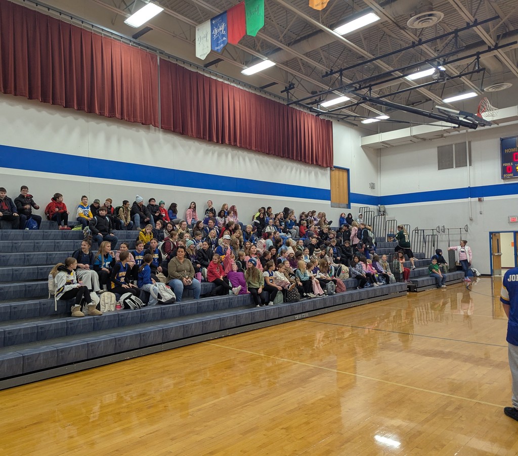 Kids watching soccer before school!
