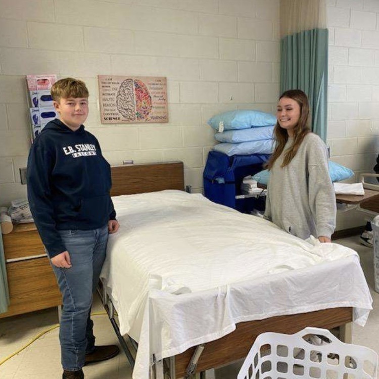 WCCTEC Health and Medical Sciences students practice making closed beds