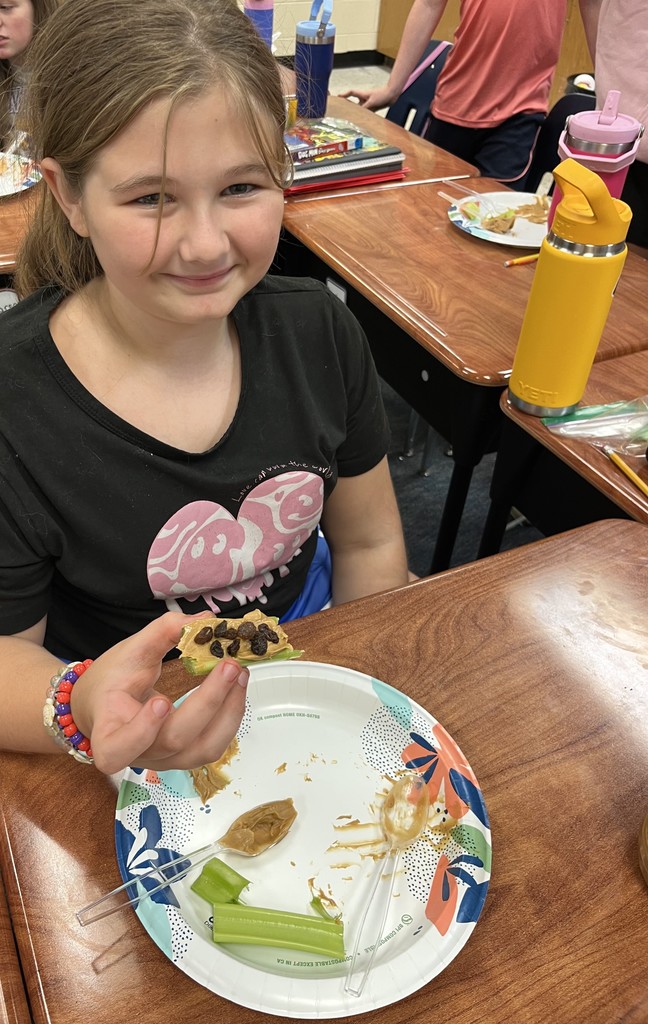 In science class, students in Mrs. Jones’ class investigated with celery to explore how water is transported throughout the plant. After this investigation, students enjoyed a snack entitled “Ants on a Log”. It was a delicious way to learn!