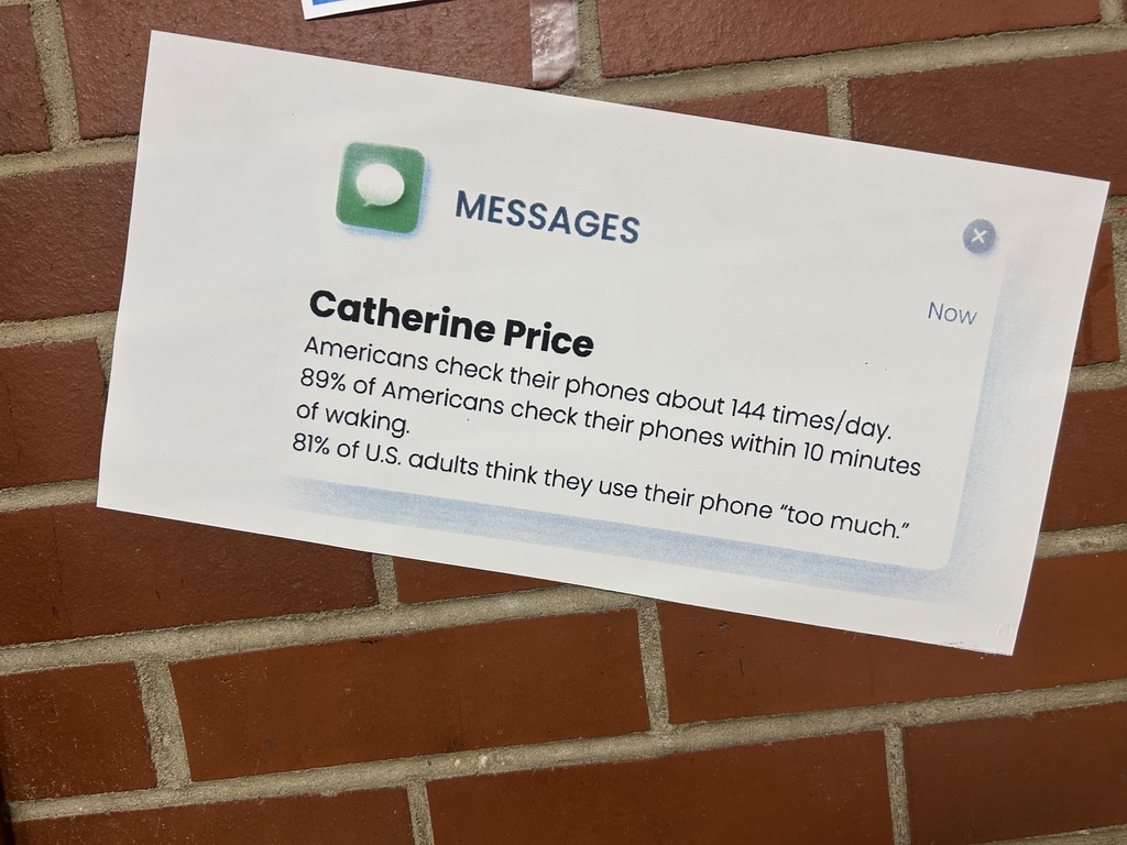 A poster with a quote from Catherine Price hangs on a wall.