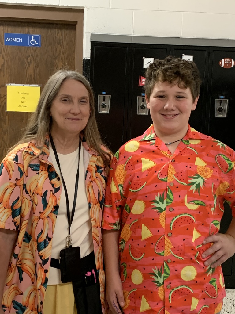 People dress up for Tropical Tuesday.