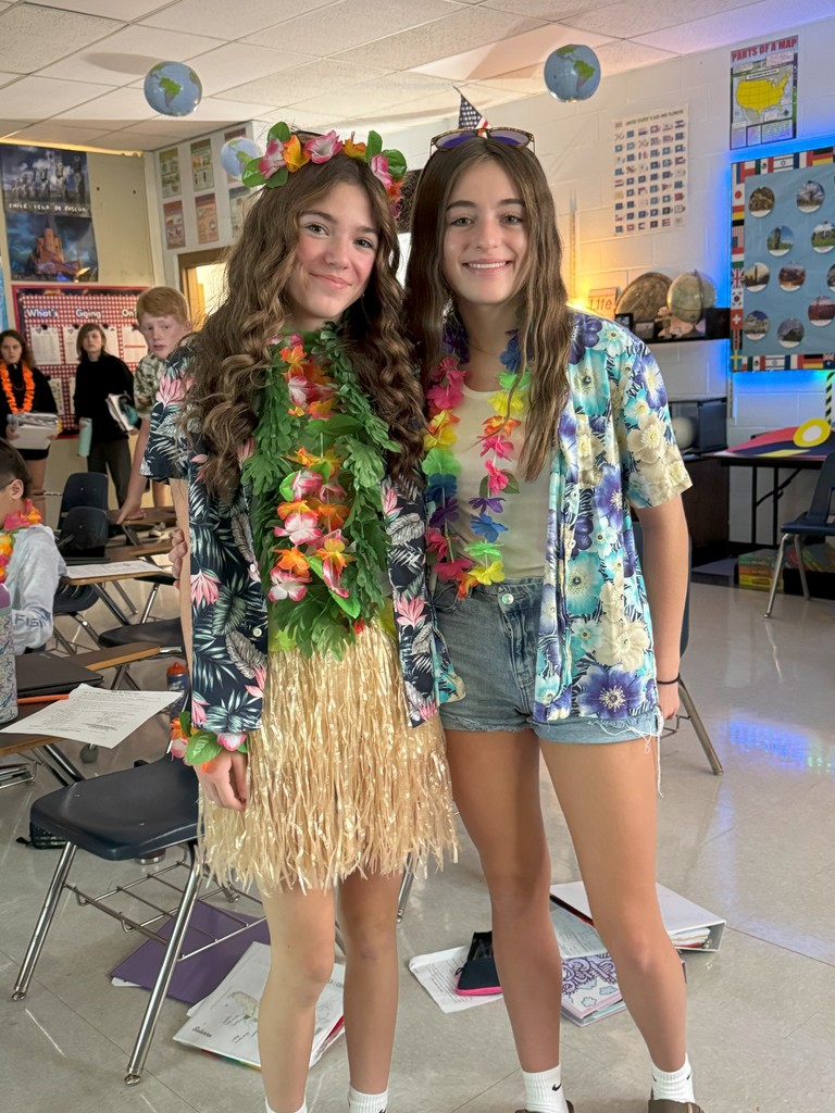 People dress up for Tropical Tuesday.