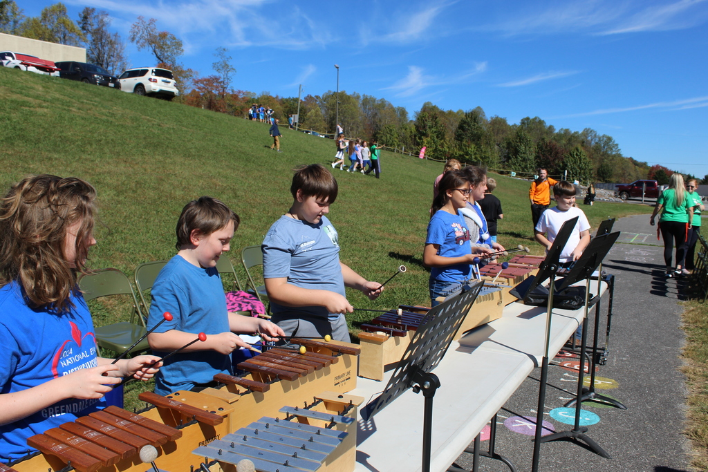 Students playing instruments.