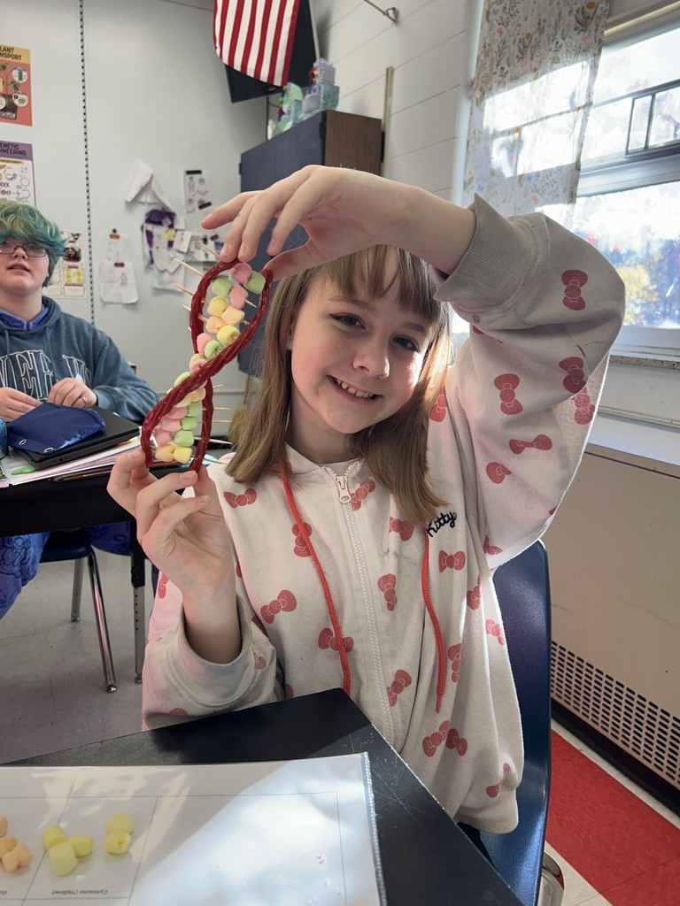 Students show off their candy DNA models.