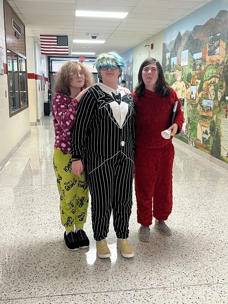 Students pose in their pajamas.