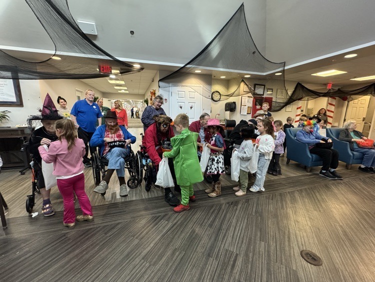 Watauga students trick-or-treat at extended care facility