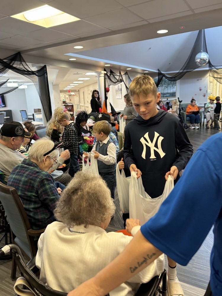 Watauga students trick-or-treat at extended care facility