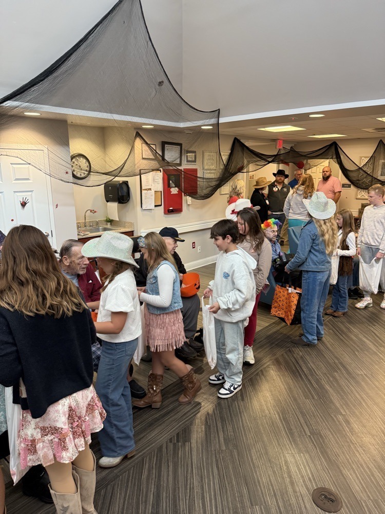 Watauga students trick-or-treat at extended care facility