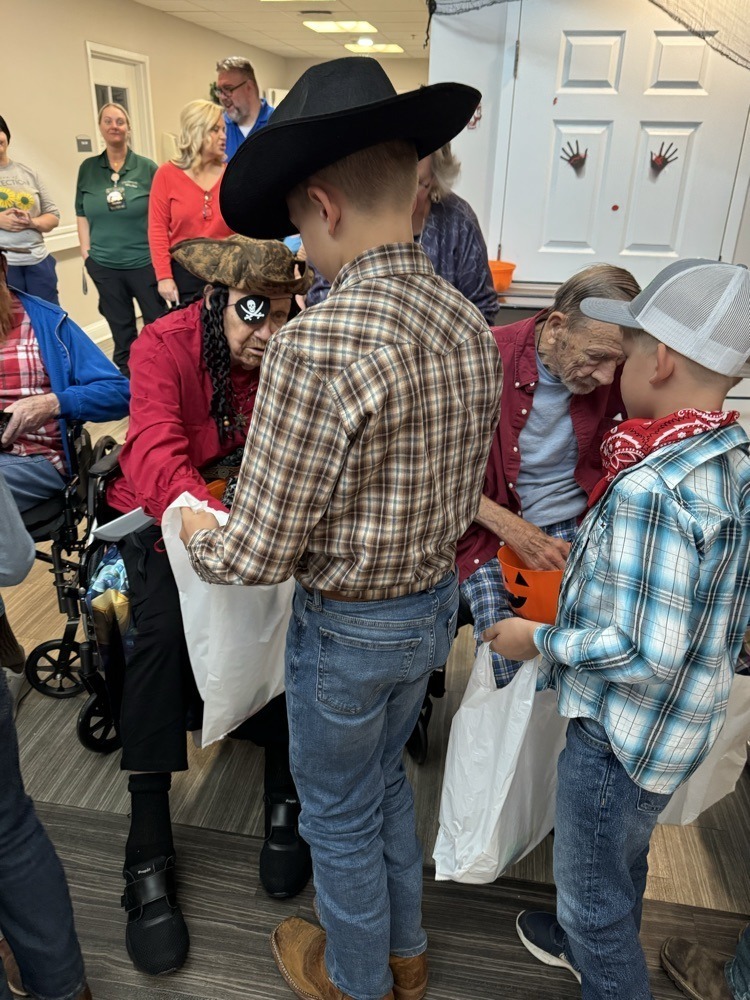 Watauga students trick-or-treat at extended care facility