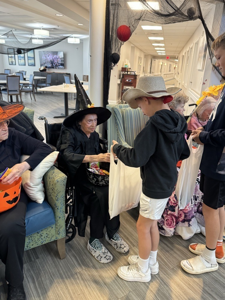 Watauga students trick-or-treat at extended care facility