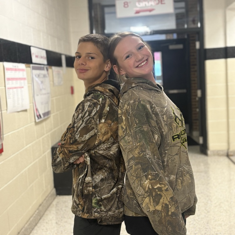 Two students are dressed alike.