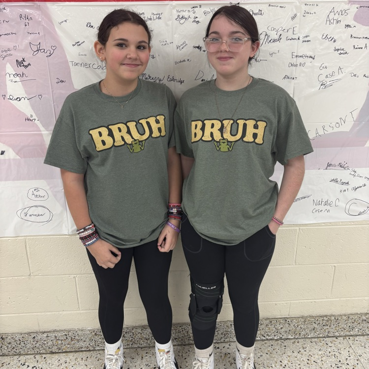 Two students are dressed alike.