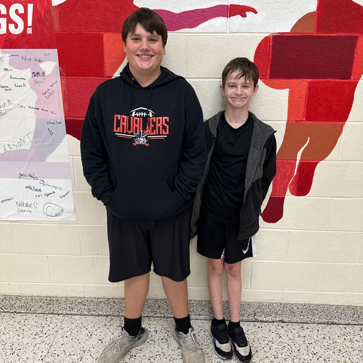 Two students are dressed alike.