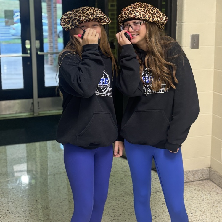 Two students are dressed alike.