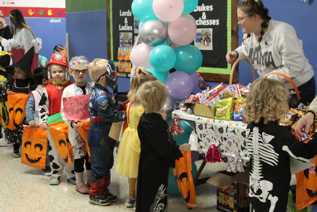 students trick-or-treating