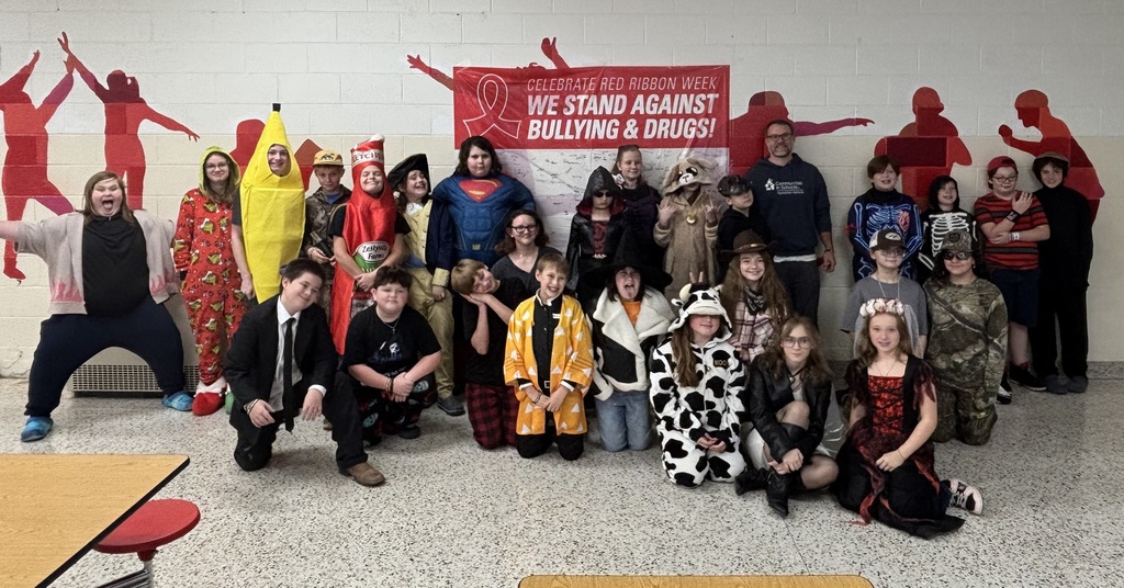 Student pose in their Halloween costumes.