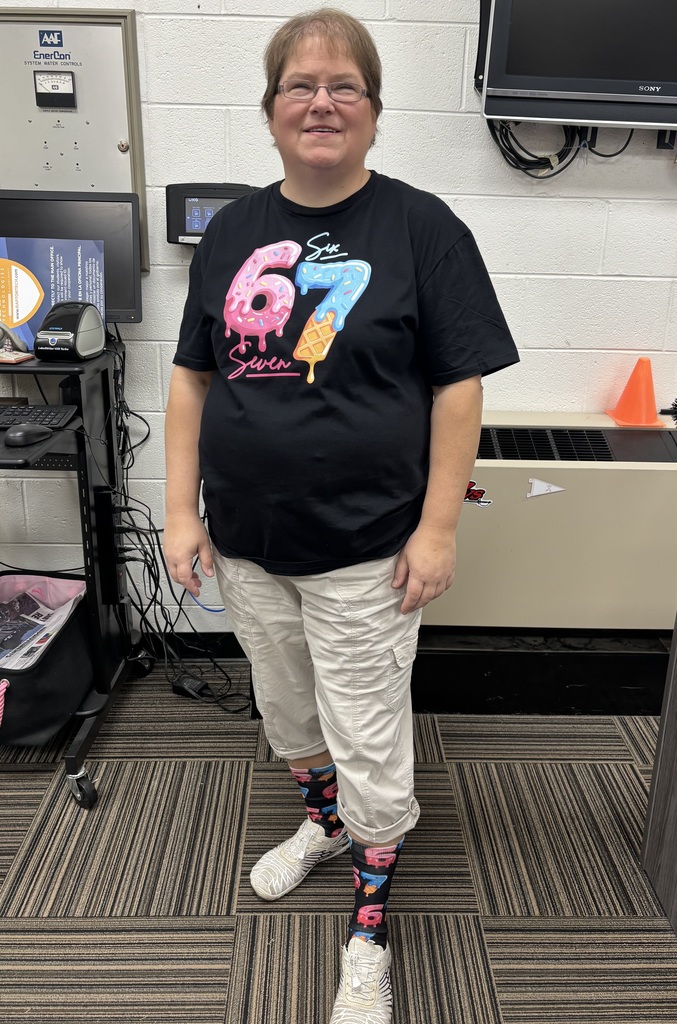 A woman poses in a Halloween costume.