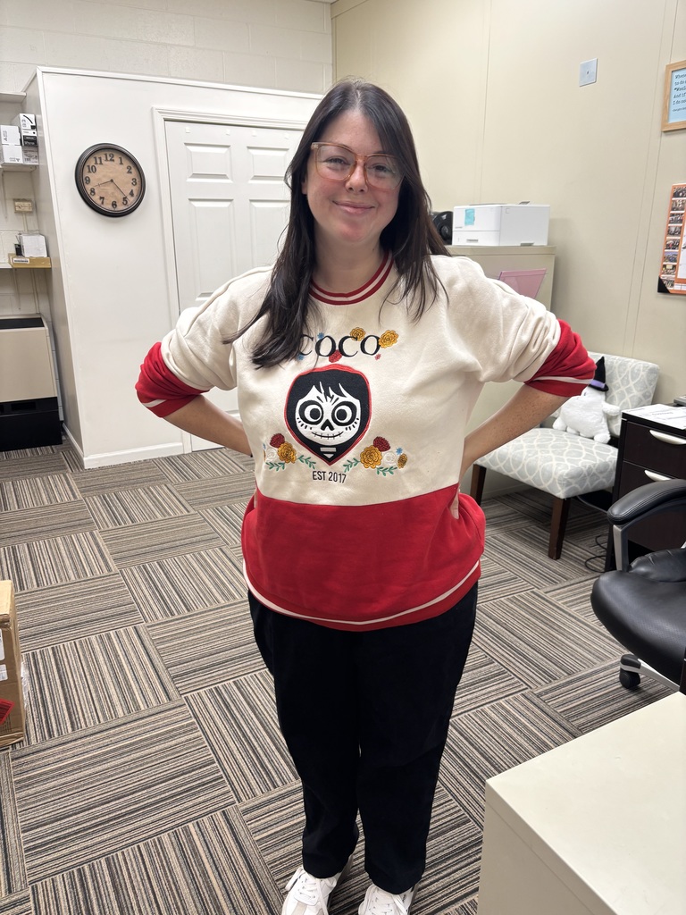 A woman poses in a Halloween costume.