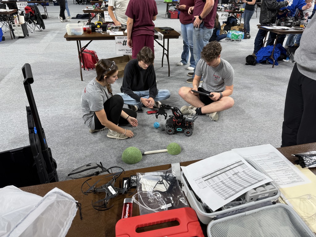 Students work with robotics.