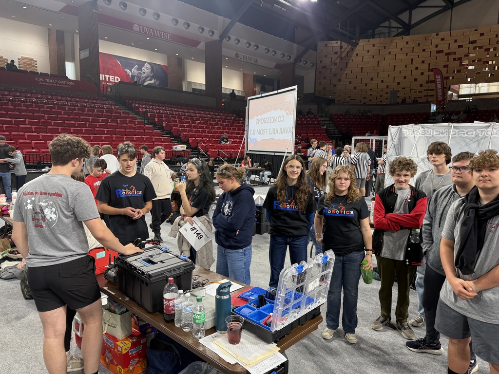 Students work with robotics.