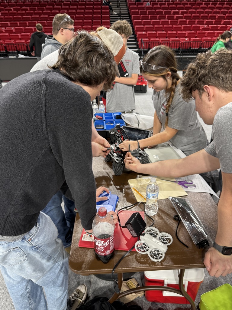 Students work with robotics.