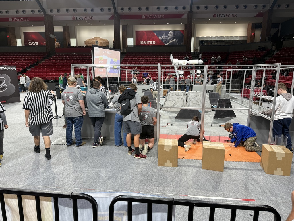 Students work with robotics.