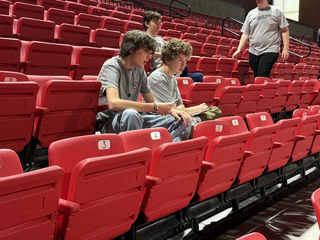 Students work with robotics.