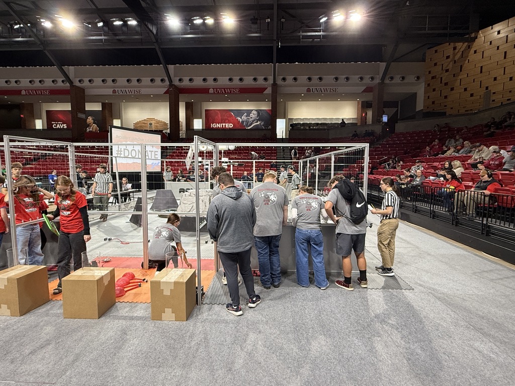 Students work with robotics.