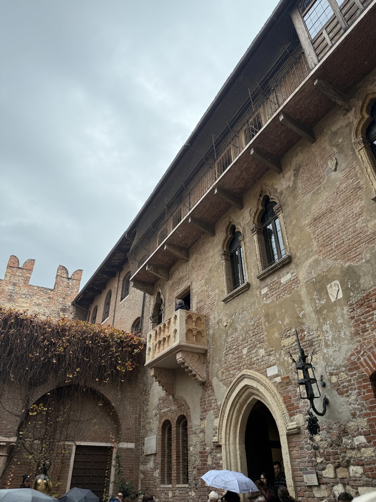Juliet's balcony and statue in Verona, Italy