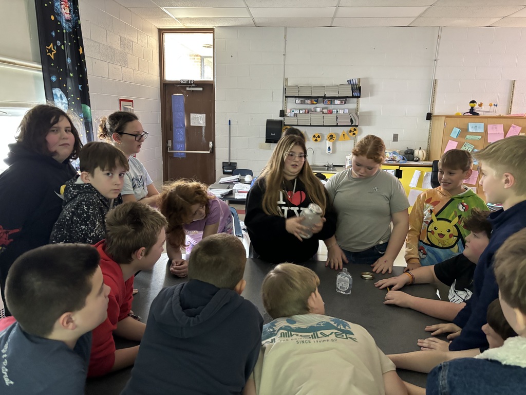 Students teach their classmates in a classroom.