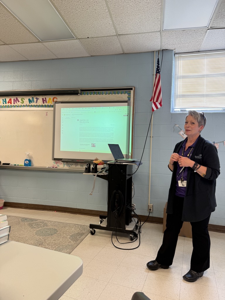A teacher presents in a classroom.
