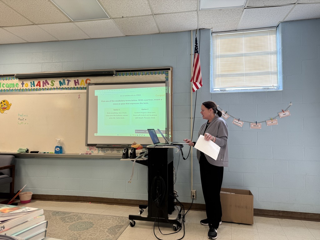 A teacher presents in a classroom.