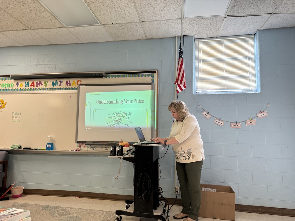 A teacher presents in a classroom.