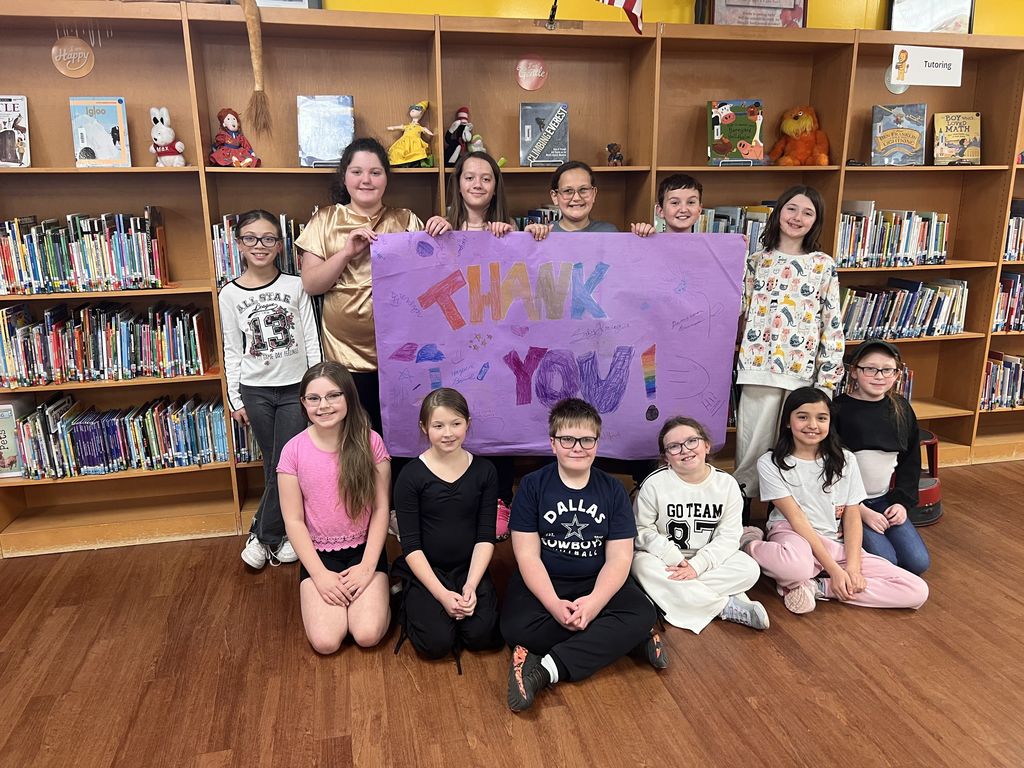 Student group holding banner