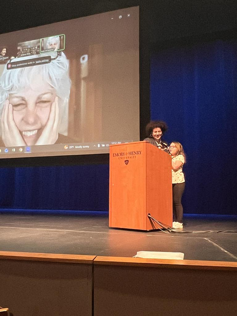 student with authors