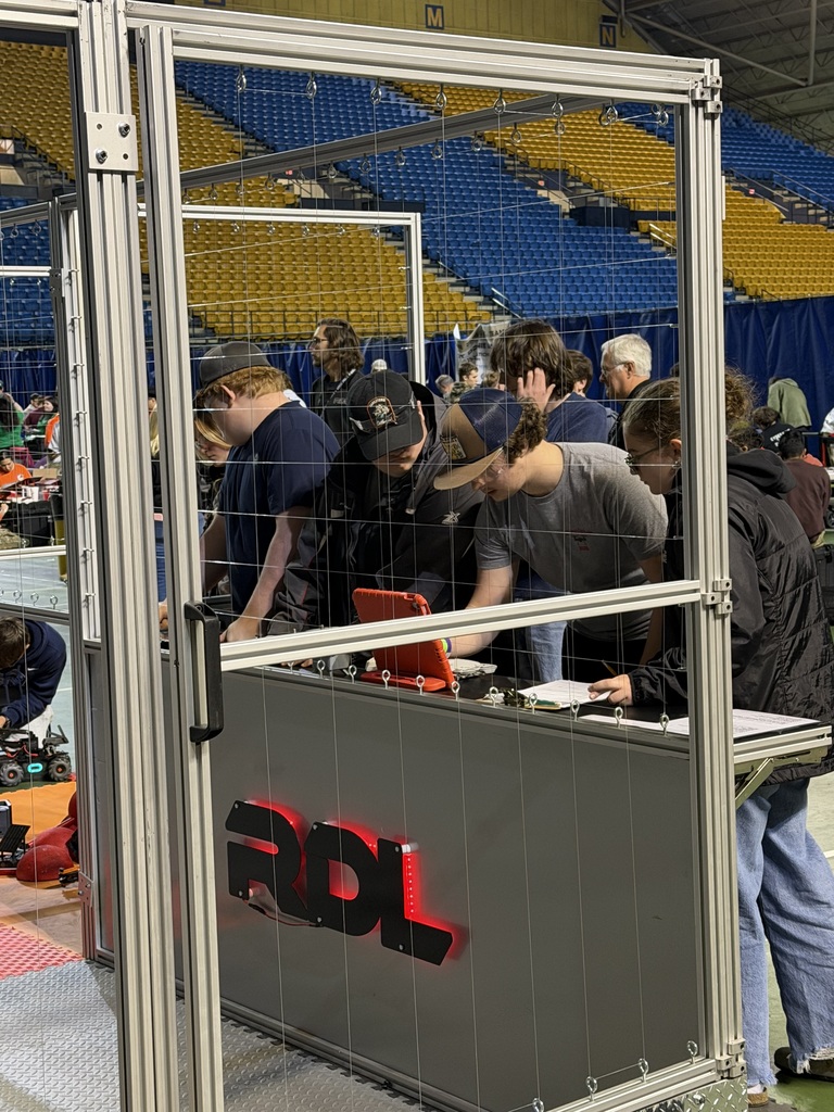 Students compete in a robotics competition.