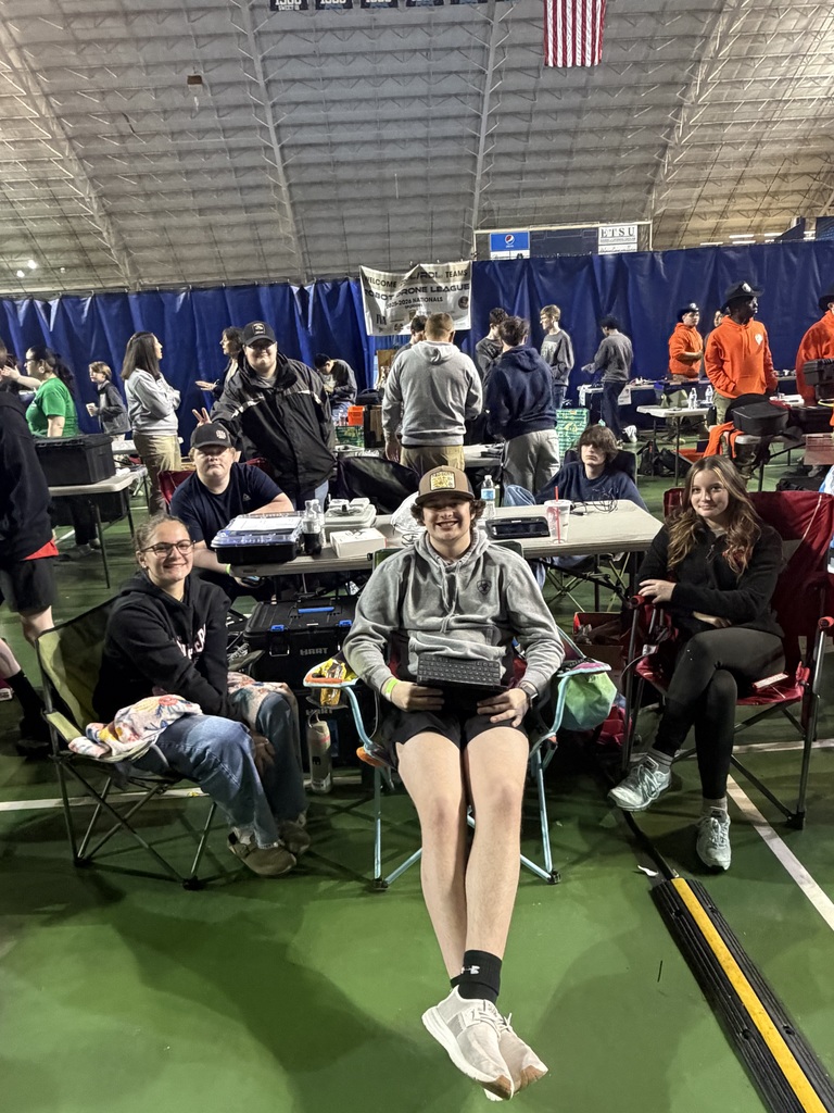 Students wait to compete in a robotics competition.